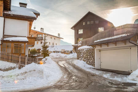 LA VILLA (BZ), ITALY - FEBRUARY 9, 2019: snow covering roofs in typical alpine viewのeditorial素材