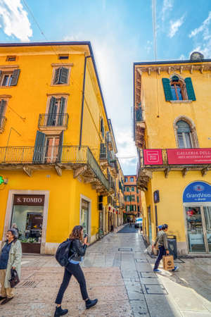 VERONA (VR), ITALY - MAY 10, 2019: tourists walking in Mazzini Street, shopping street of the...