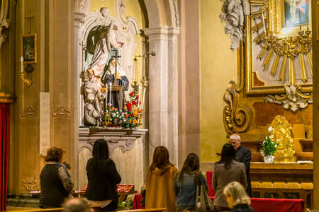 LUGO (RA), ITALY - May 22, 2019: priest blessing faithfuls in the Feast day of Saint Rita of Cascia, patron of Lost and impossible causes, of abused wives and widowsのeditorial素材
