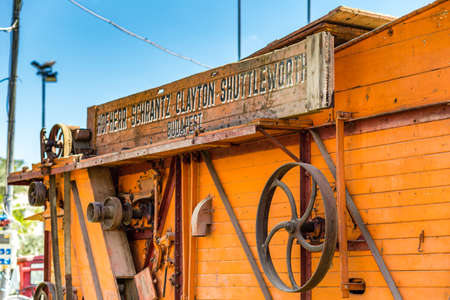 ALFONSINE (RA), ITALY - MAY 16, 2019: sunlight is enlightening a very old threshing machine by Hofherr-Schrantz-Clayton-Shuttleworth Budapest at Sagra delle Alfonsine Country Festival in Italyのeditorial素材
