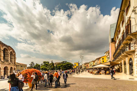 VERONA (VR), ITALY - MAY 10, 2019: tourists walking in Piazza Bra, square of the Arena in historical center of Verona, city of loversのeditorial素材