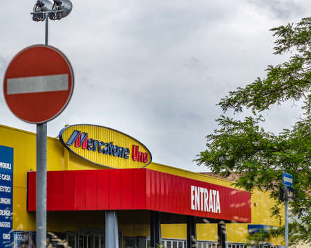 RUSSI (RA), ITALY - MAY 27, 2019: sunlight is enlightening logo of Mercatone Uno on storefront of...