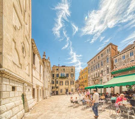 VENEZIA, ITALY â MAY 31, 2019: tourists visiting the city and enjoying drinks in a bar of Fondamenta Santa Maria Formosa in Veniceのeditorial素材