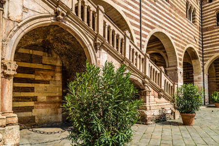 VERONA (VR), ITALY - MAY 10, 2019: sunlight enlightening The Palace of The Ragione in Verona, city of lovers in Italyのeditorial素材