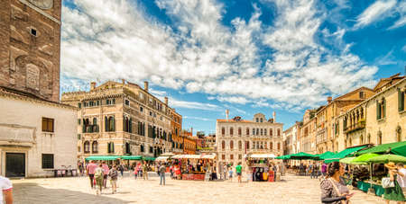 VENEZIA, ITALY â MAY 31, 2019: tourists visiting the city and enjoying street market in Campo Campo Santa Maria Formosa, typycal square of Veniceのeditorial素材