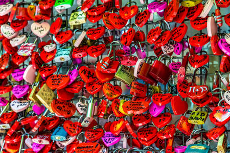 VERONA (VR), ITALY - MAY 10, 2019: sunlight is enlightening padlocks left by lovers in the House of Juliet in Verona, city of lovers in Italyのeditorial素材