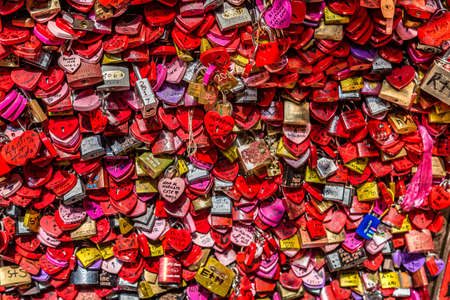 VERONA (VR), ITALY - MAY 10, 2019: sunlight is enlightening padlocks left by lovers in the House of Juliet in Verona, city of lovers in Italyのeditorial素材