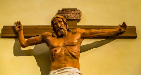 BOLOGNA, ITALY - MAY 10, 2019: sunlight is enlightening statue of the Crucifixion of Jesus in the Catholic Church of The Sacred Heart of Jesus in Bolognaのeditorial素材