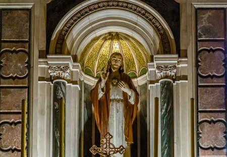 BOLOGNA, ITALY - MAY 10, 2019: sunlight is enlightening statue of Jesus Christ in the Catholic Church of The Sacred Heart of Jesus in Bolognaのeditorial素材