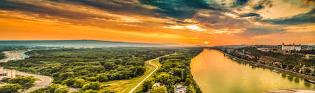 sunset over the Danube river in Bratislava, capital of Slovakiaの写真素材
