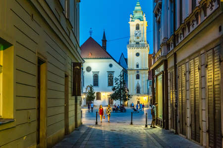 BRATISLAVA, SLOVAKIA - AUGUST 27, 2019: tourists visiting main square of historical center of  Bratislava, capital city of Slovakiaのeditorial素材