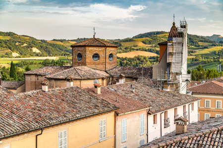 BRISIGHELLA (RA), ITALY - AUGUST 13, 2019: sunset light is enlightening the roofs of the historical center of Brisighella, medieval village in Emilia Romagnaのeditorial素材