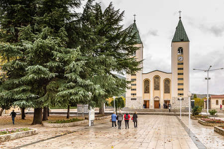 MEDUGORJE, BOSNIA AND HERZEGOVINA - NOVEMBER 3, 2019: pilgrims visiting St. James' Parish Churchのeditorial素材