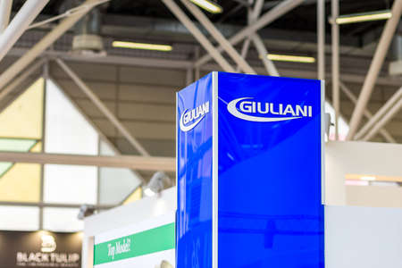 BOLOGNA, ITALY - APRIL 12, 2019: light is enlightening GIULIANI logo in Cosmofarma Exhibition, the...