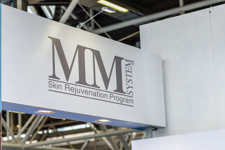 BOLOGNA (BO), ITALY - APRIL 12, 2019: light is enlightening logo in Cosmofarma Exhibition, the...
