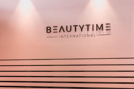 BOLOGNA, ITALY - APRIL 12, 2019: light is enlightening BEAUTYTIME logo in Cosmofarma Exhibition, the pharmacy worldâs leading European event for the Health Care and Beauty Care sectors and all pharmacy-related servicesのeditorial素材