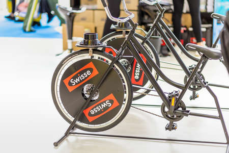 BOLOGNA (BO), ITALY - APRIL 12, 2019: light is enlightening Swisse logo in Cosmofarma Exhibition,...