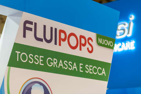 BOLOGNA (BO), ITALY - APRIL 12, 2019: light is enlightening FLUIPOPS logo in Cosmofarma Exhibition, the pharmacy worldâs leading European event for the Health Care and Beauty Care sectorsのeditorial素材