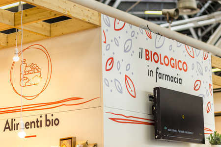 BOLOGNA (BO), ITALY - APRIL 12, 2019: light is enlightening logo in Cosmofarma Exhibition, the pharmacy worldâs leading European event for the Health Care and Beauty Care sectorsのeditorial素材
