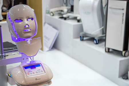 BOLOGNA (BO), ITALY - MARCH 18, 2019: light is enlightening equipment at COSMOPROF, trade show of the beauty industryのeditorial素材