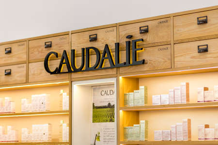 BOLOGNA (BO), ITALY - APRIL 12, 2019: light is enlightening CAUDALIE logo in Cosmofarma Exhibition, the pharmacy worldâs leading European event for the Health Care and Beauty Care sectorsのeditorial素材