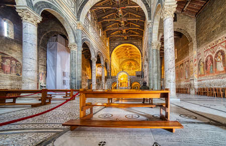 FLORENCE, ITALY - DECEMBER 15, 2019: man praying in San Miniato Church in Florence  in Tuscany, Italyのeditorial素材