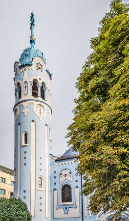 BRATISLAVA, SLOVAKIA - AUGUST 28, 2019: sunlight is enlightening Blue Church, Art Noveau building in Bratislava, capital city of Slovakiaのeditorial素材