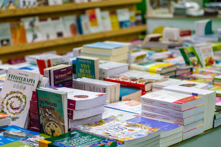 BOLOGNA (BO), ITALY - SEPTEMBER 6, 2019: lights are enlightening books at SANA 2019, 31st international exhibitionof organic and natural productsのeditorial素材