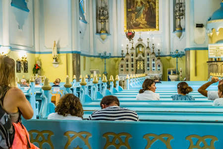 BRATISLAVA, SLOVAKIA - AUGUST 28, 2019: people praying in the Blue Church, Art Noveau building in Bratislava, capital city of Slovakiaのeditorial素材