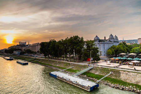 BRATISLAVA, SLOVAKIA - AUGUST 28, 2019: waters of Danube river flowing along Bratislava, capital city of Slovakiaのeditorial素材