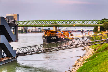 BRATISLAVA, SLOVAKIA - AUGUST 28, 2019: waters of Danube river flowing along Bratislava, capital city of Slovakiaのeditorial素材