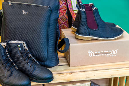 BOLOGNA (BO), ITALY - SEPTEMBER 6, 2019: lights are enlightening shoes at SANA 2019, 31st international exhibitionof organic and natural productsのeditorial素材