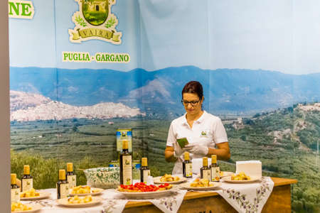 BOLOGNA (BO), ITALY - SEPTEMBER 6, 2019: ehibitor waiting for visitors at SANA 2019, 31st international exhibitionof organic and natural productsのeditorial素材