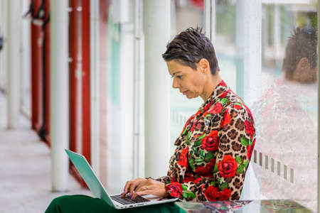 BOLOGNA (BO), ITALY - SEPTEMBER 6, 2019: visitor sitting and resting at SANA 2019, 31st international exhibitionof organic and natural productsのeditorial素材