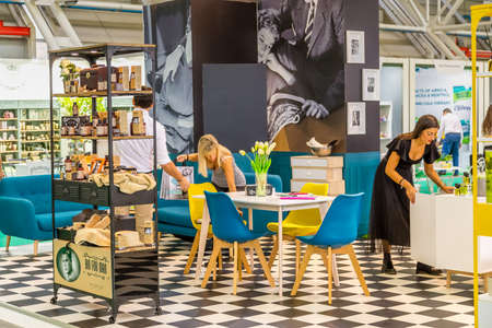 BOLOGNA (BO), ITALY - SEPTEMBER 6, 2019: ehibitor waiting for visitors at SANA 2019, 31st international exhibitionof organic and natural productsのeditorial素材