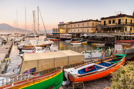 NAPLES, ITALY - JANUARY 2, 2020: 
boats moored in marina in the Gulf of Naples, Italyの写真素材
