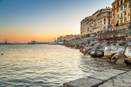 NAPLES, ITALY - JANUARY 2, 2020: people are walking on the promenade of Naples, Italyの写真素材