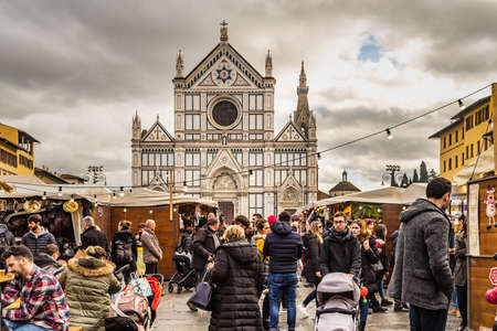 FLORENCE, ITALY - DECEMBER 15, 2019: tourists are visiting the German Christmas market in Florence in Italyのeditorial素材