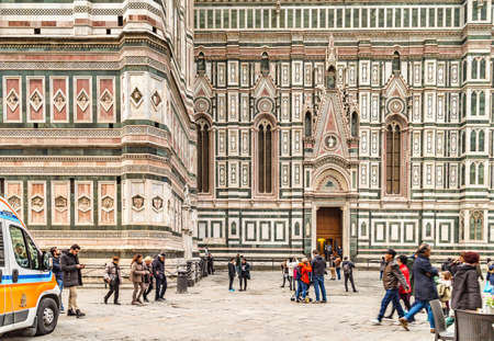 FLORENCE, ITALY - DECEMBER 15, 2019: tourists are visiting Santa Maria in Fiore Cathedral in...