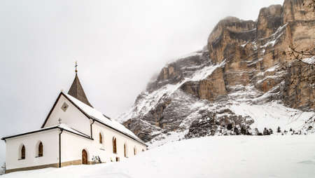 snow covering La Crusc Santa Croce Sanctuaryの写真素材