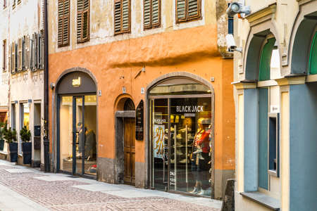 Brunico (BZ), February 12, 2019: sunlight is enlightening the street of the historical center of Brunicoのeditorial素材
