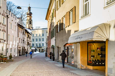 Brunico (BZ), February 12, 2019: people walking in street of historical centerのeditorial素材