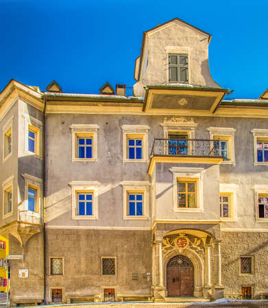 Brunico (BZ), February 12, 2019: sunlight is enlightening the street of the historical center of Brunicoのeditorial素材