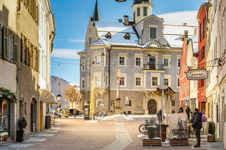 Brunico (BZ), February 12, 2019: people walking in street of historical centerのeditorial素材