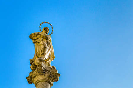 Brunico (BZ), February 12, 2019: sunlight is enlightening statue of The Blessed Virgin Maryのeditorial素材