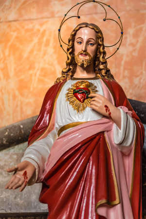 LUGO (RA) - JUNE 1, 2019: Jesus Christ pointing The Sacred Heart in the Sanctuary of Madonna del Molino where people in pilgrimage ask for protection against Coronavirusのeditorial素材