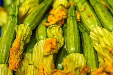 closeup of fresh vegetables, courgette flowers,の写真素材