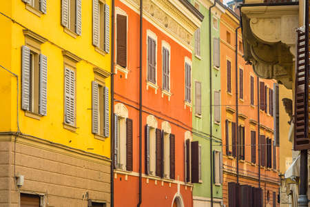 typical windows of ancient buildings in the historical center of Modena in Italyのeditorial素材