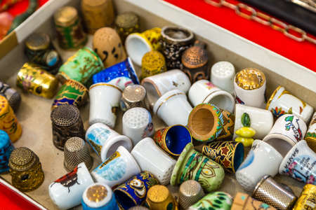 CESENA (FC) - FEBRUARY 17, 2019: lights are enlightening thimbles for sale on stalls at antique fairのeditorial素材