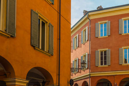 typical windows of ancient buildings in the historical center of Modena in Italy
